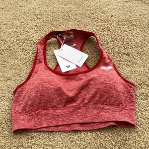 New! Womens Best Move seamless sports bra in red marl with removable pads.